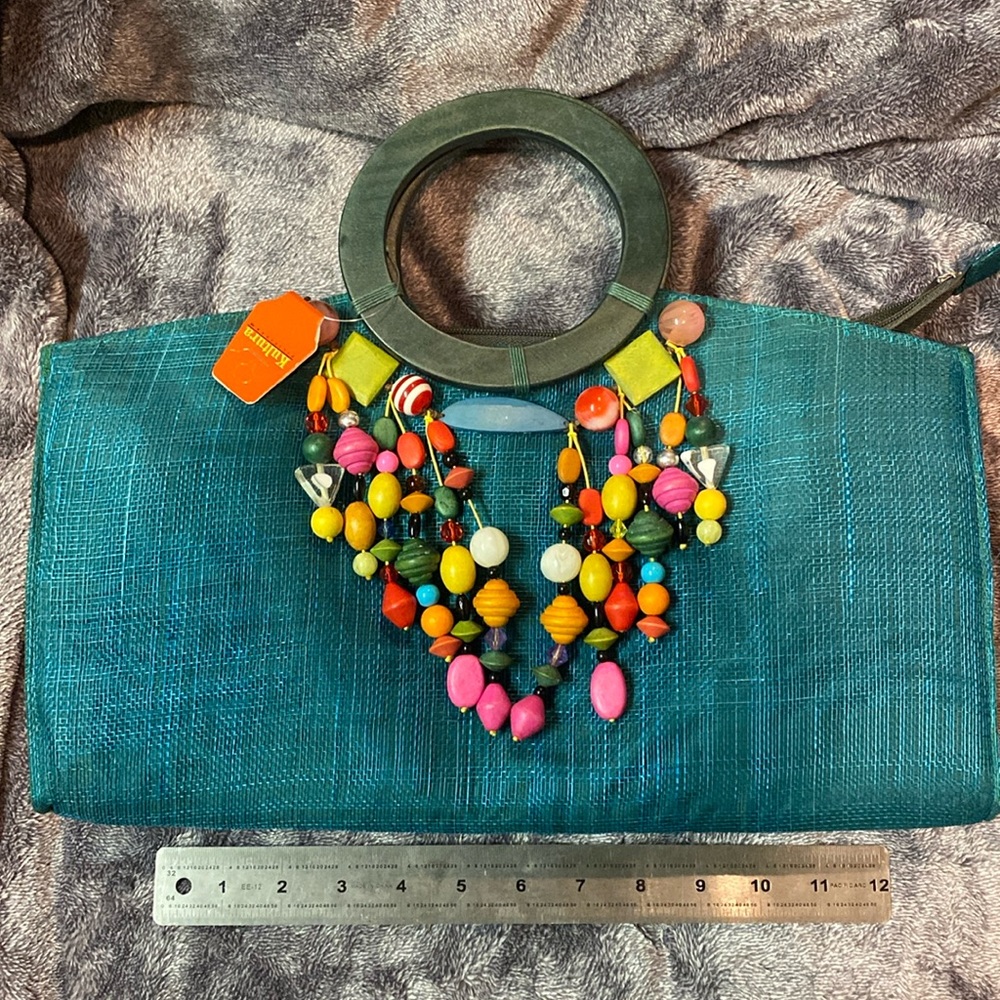 BNEW Green Kultura woven bag with zipper and colorful accent design